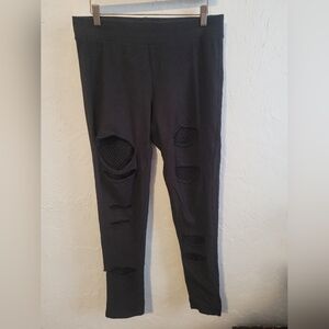 Torrid Slashed Fishnet Leggings